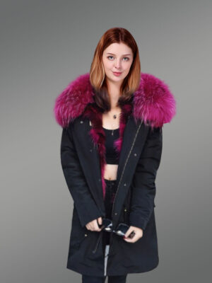 Women’s solid long black parka with maroon raccoon fur hood